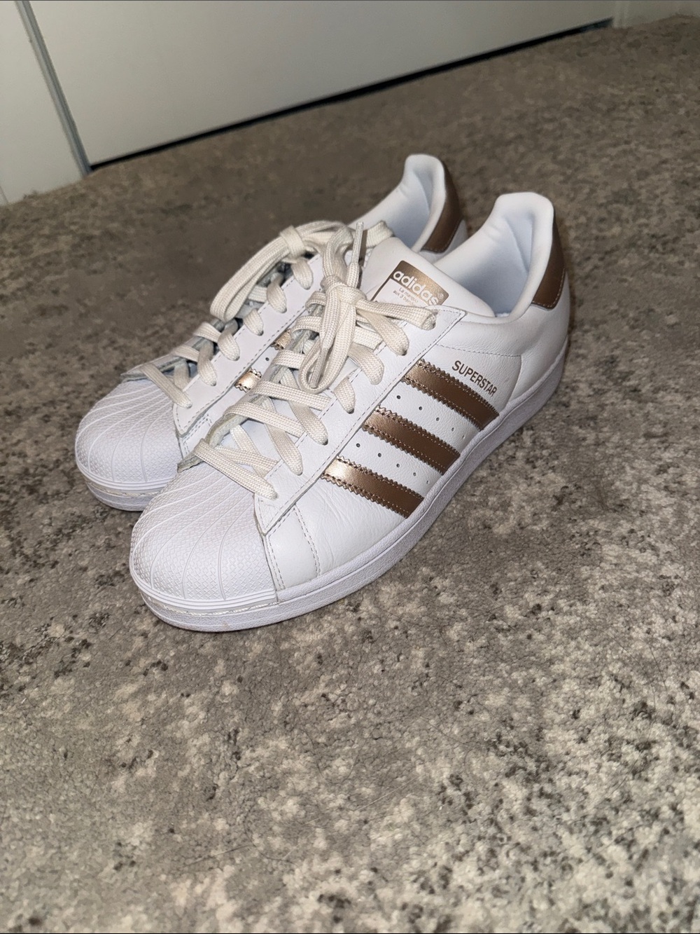 LIKE BRAND NEW. adidas Women's White Sneakers with Metallic Gold Stripes